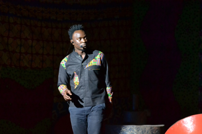 Raymond Besiga speaking at TEDx Kampala